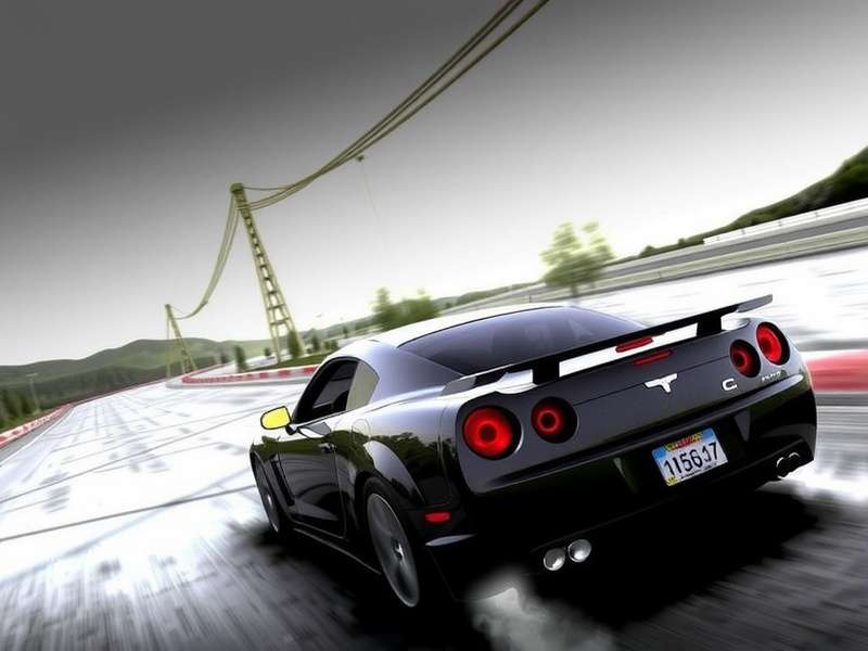 Need for Speed Most Wanted PC game screenshot showing high-speed police chase